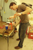 0801707_2012_photo_3_-_undergraduate_crushing_poppy_seeds_spring_2012